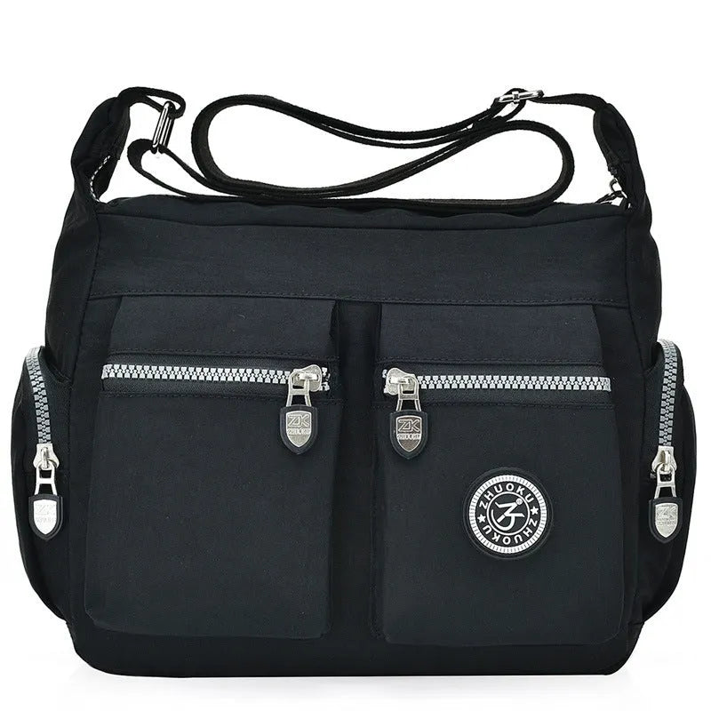 Nylon shoulder crossbody bag in casual style, available in multiple colours like black and red.