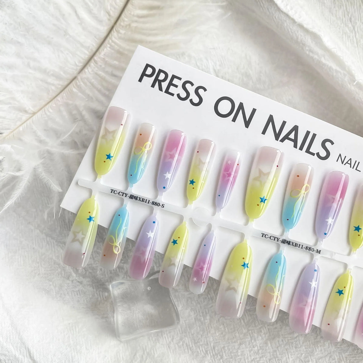Sweet XB11-880 oval almond nail stickers by Dopamine Cartoon XINGX in frosted and glossy finishes on a white background