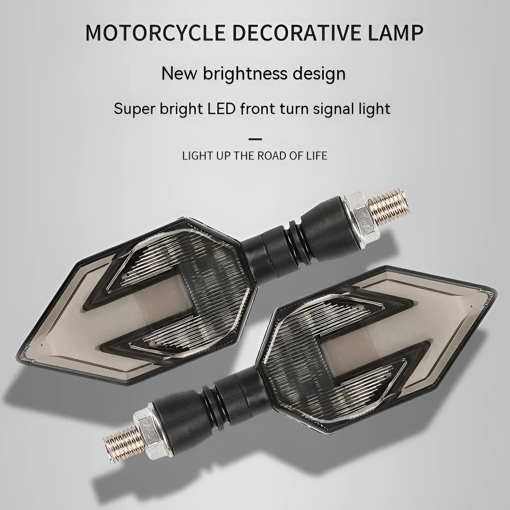 Arrow-shaped LED motorcycle turn signal light with ABS plastic housing for 12V systems.
