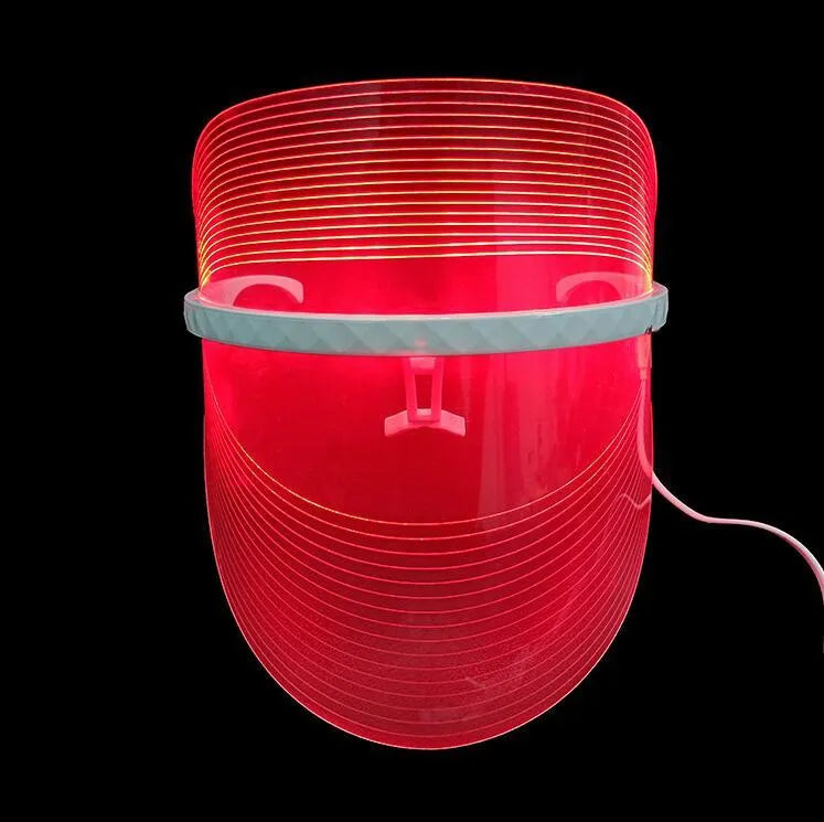 Transparent ABS LED light therapy face mask with red, blue, and yellow lights, 210x175x140mm, 83g, USB phone connection.