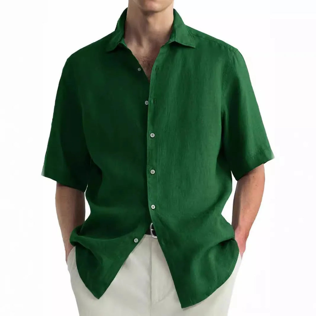 Man wearing a green washed cotton casual cardigan-style shirt.