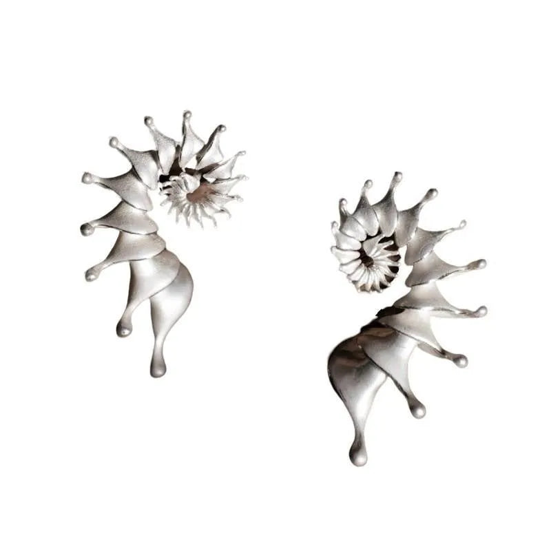 Three-dimensional matte conch shell stud earrings with electroplated alloy construction and irregular shape
