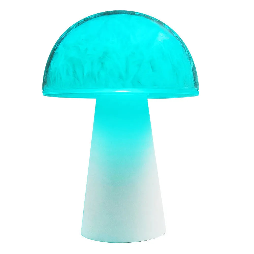 White mushroom-shaped night light with remote control on a wooden surface, showing soft RGB glow.