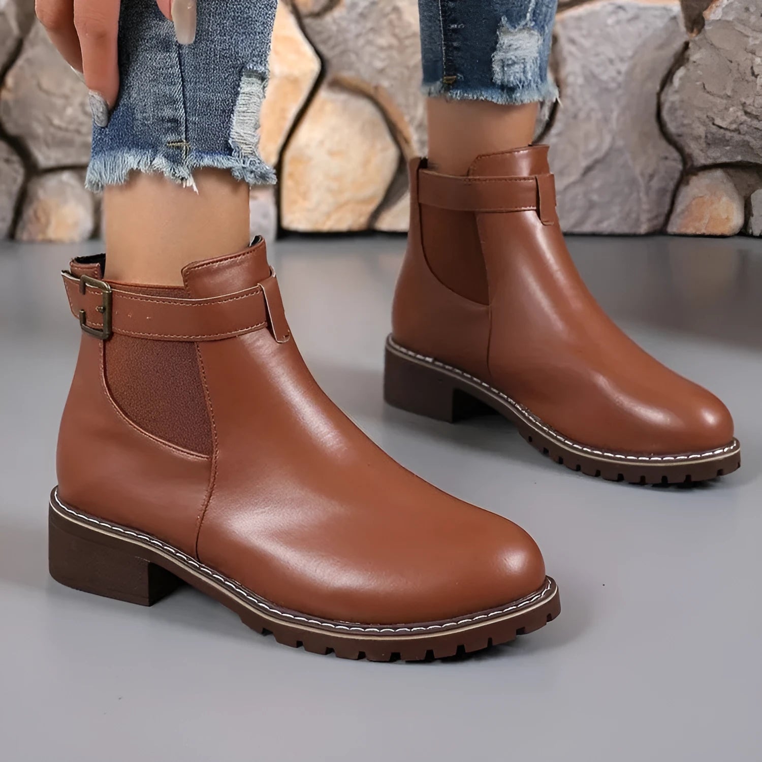 Women's round toe ankle boots with belt buckle decoration in black or chocolate brown