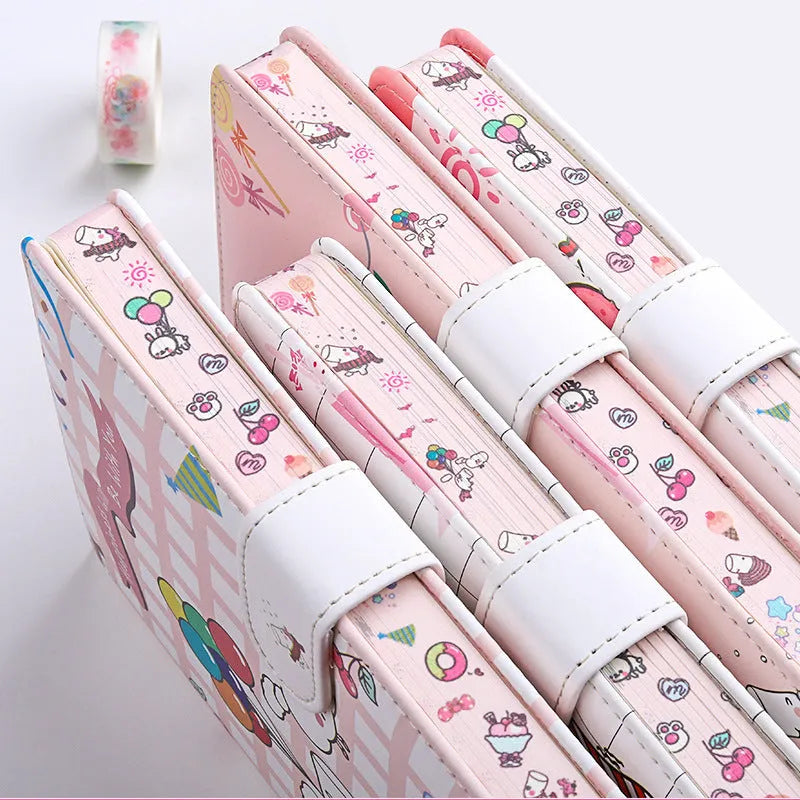 White Kaba Bear Hippo A6 notebook with magnetic buckle and heart design, showing size next to a pen.