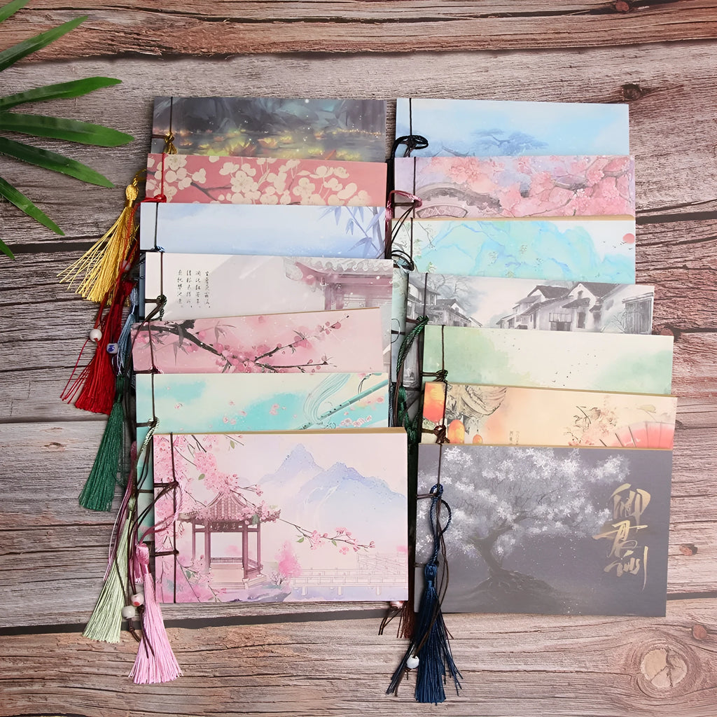 A5 kraft paper notebook with a hand-stitched binding and a hanging tassel bookmark in a natural design.