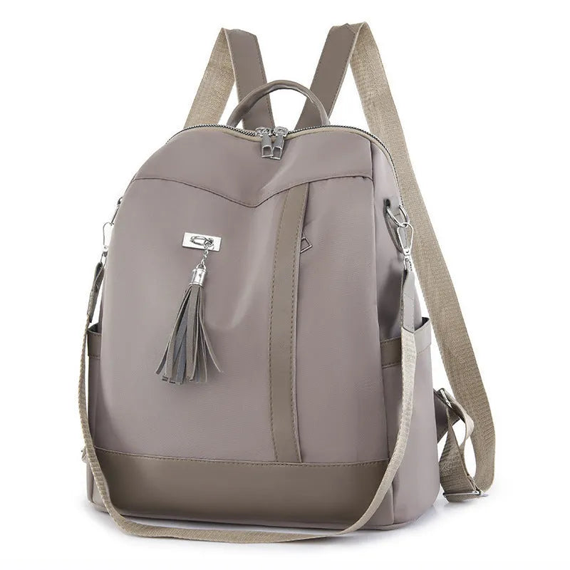 Women's Oxford cloth backpack with large capacity, anti-theft design, and multiple pockets in Black