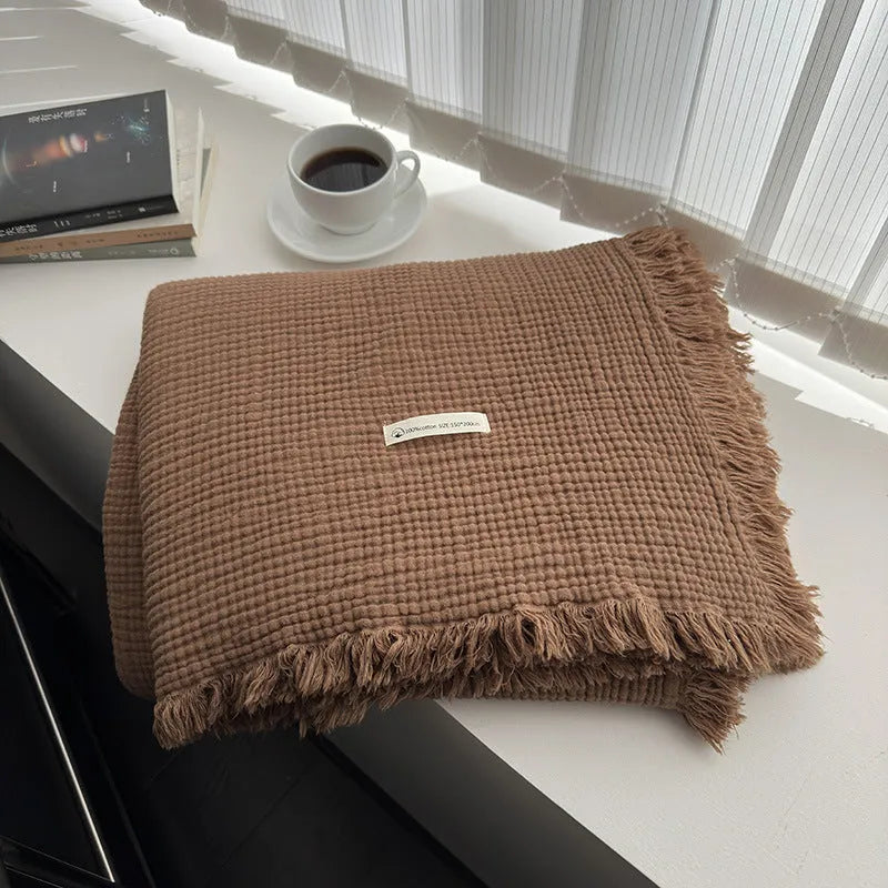 Four-layer gauze cotton blanket with tassel trim in an array of ten colours