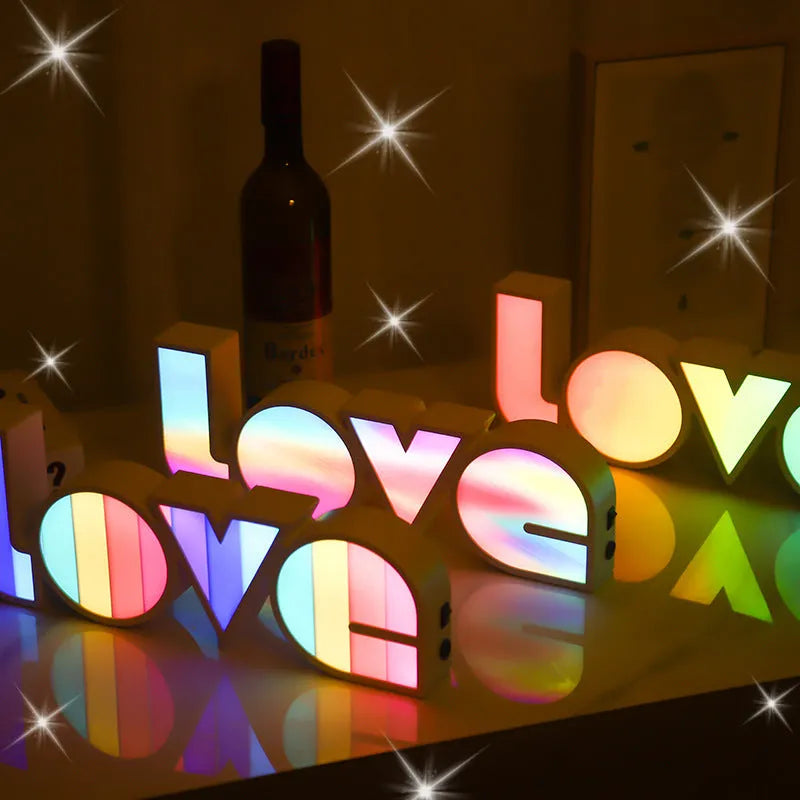 LED LOVE light with rainbow style plastic lampshade showing 'LOVE' word decoration