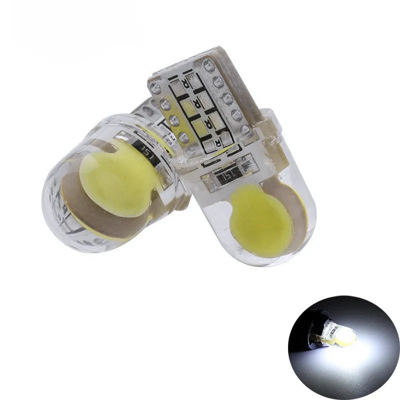 Ten T10 LED bulbs for cars in various colours including blue, red, and white, showing their 21.5mm length.