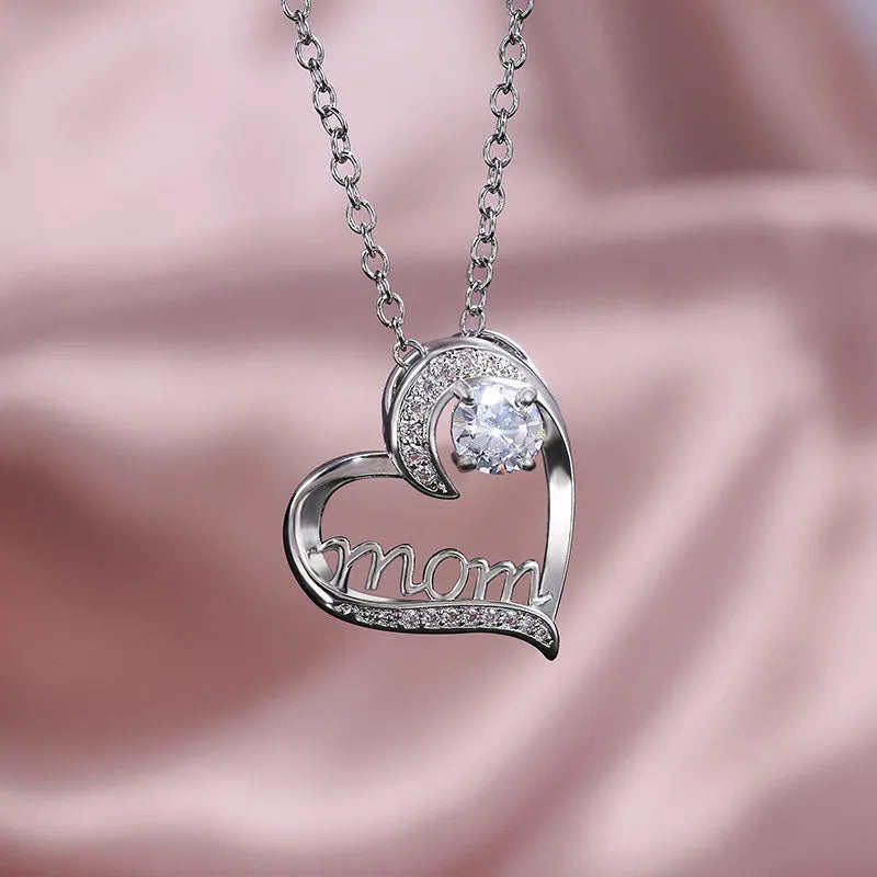Heart claw necklace with zircon and artificial gem on copper chain, green colour, pendant 2.5x2.3cm