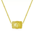 Copper electroplated gold tone necklace with a capital letter 'A' charm pendant on a chain.