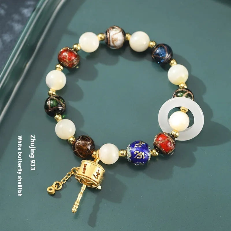 Hand-woven women's bracelet with fragrant grey coloured glaze and round beads