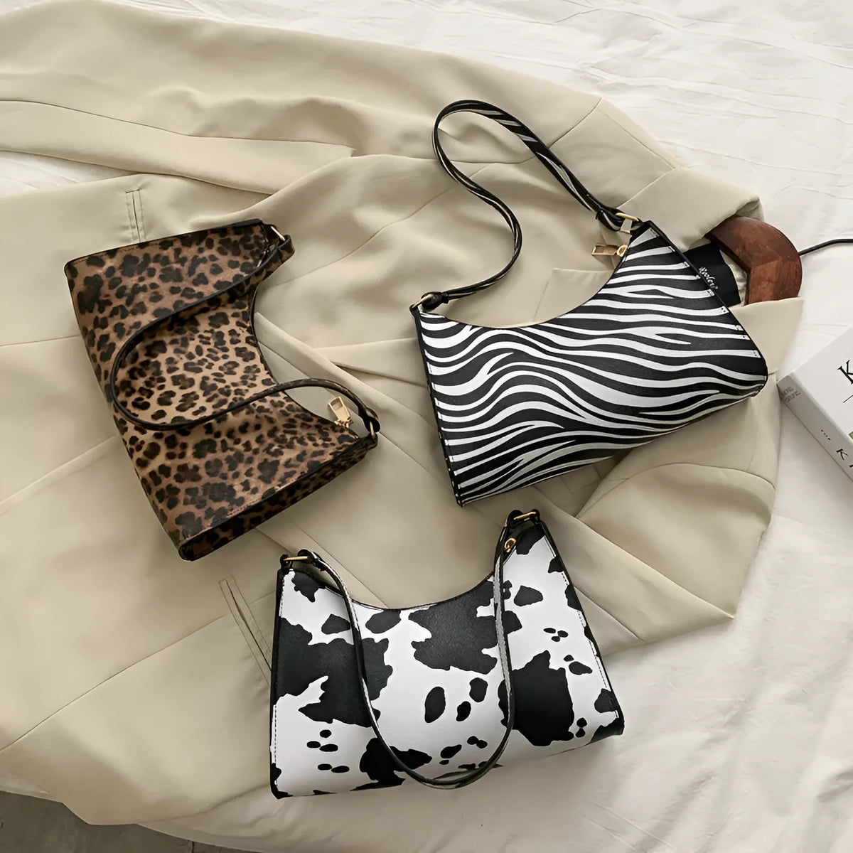 Women's small square leopard print underarm bag in soft PU with zip closure and single strap