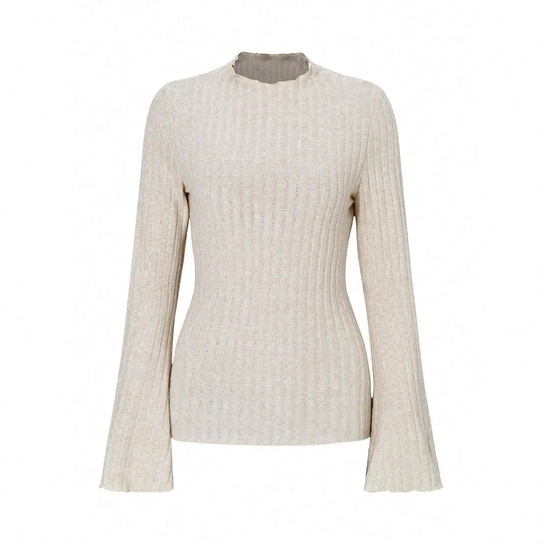 Black slim-fit long sleeve top with round neck and subtle sunken stripe pattern on soft brushed fabric.