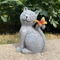 Outdoor solar lamp with cute kitten ornament in plastic and resin, 14x9x21cm, placed in garden setting