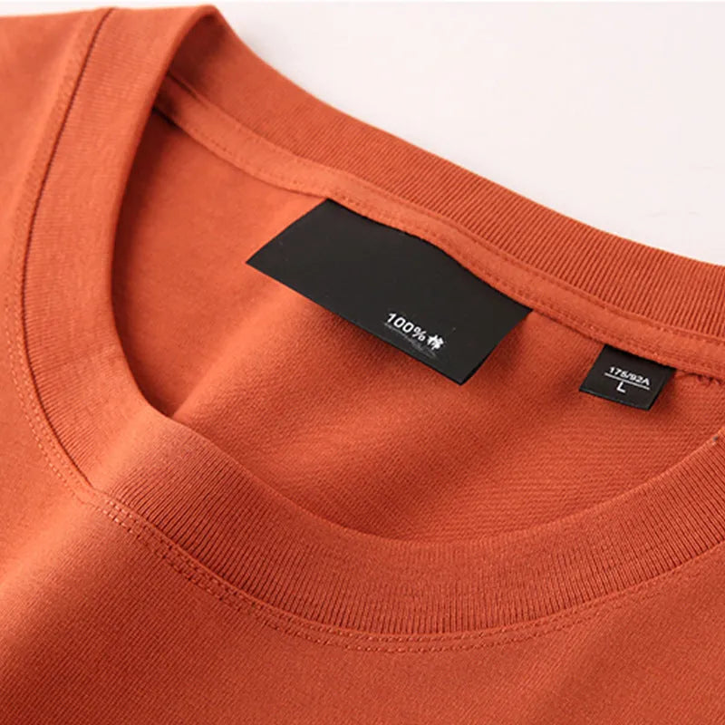 Cotton solid colour round neck casual T-shirt with drop shoulder sleeves in loose fit