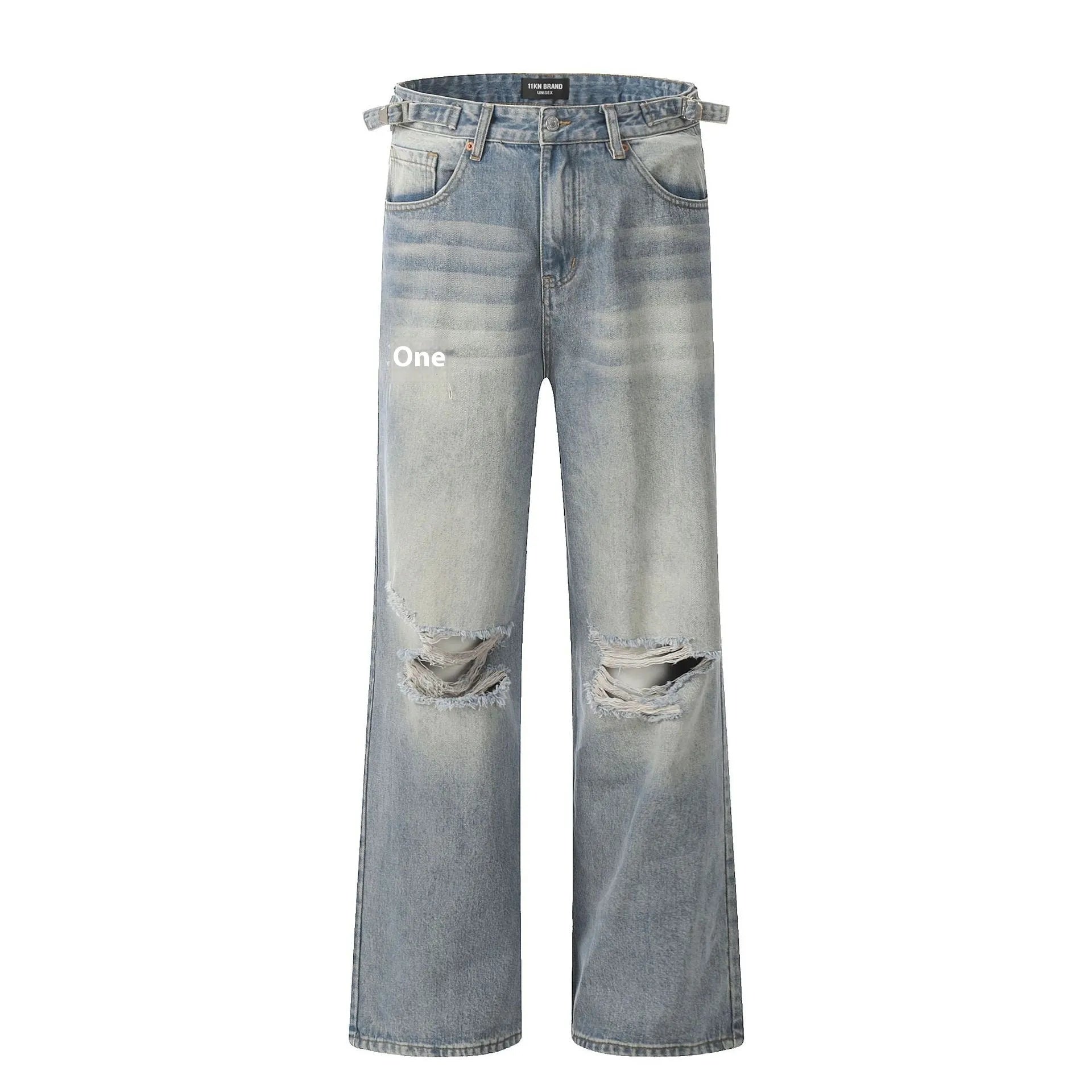 Blue men's straight-leg ripped jeans on a neutral background, showing zipper fly and cotton blend fabric texture.