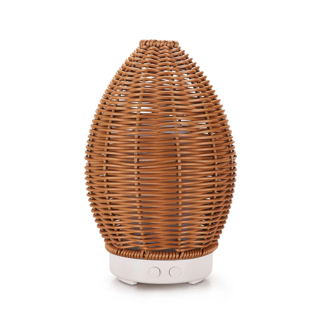 Hollow rattan aroma diffuser with light wood grain base, 100ml capacity for essential oils