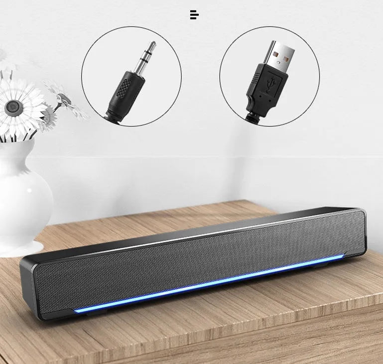 KH V196 plastic 2.0 computer speakers in black with trapezoidal mesh design and breathing light