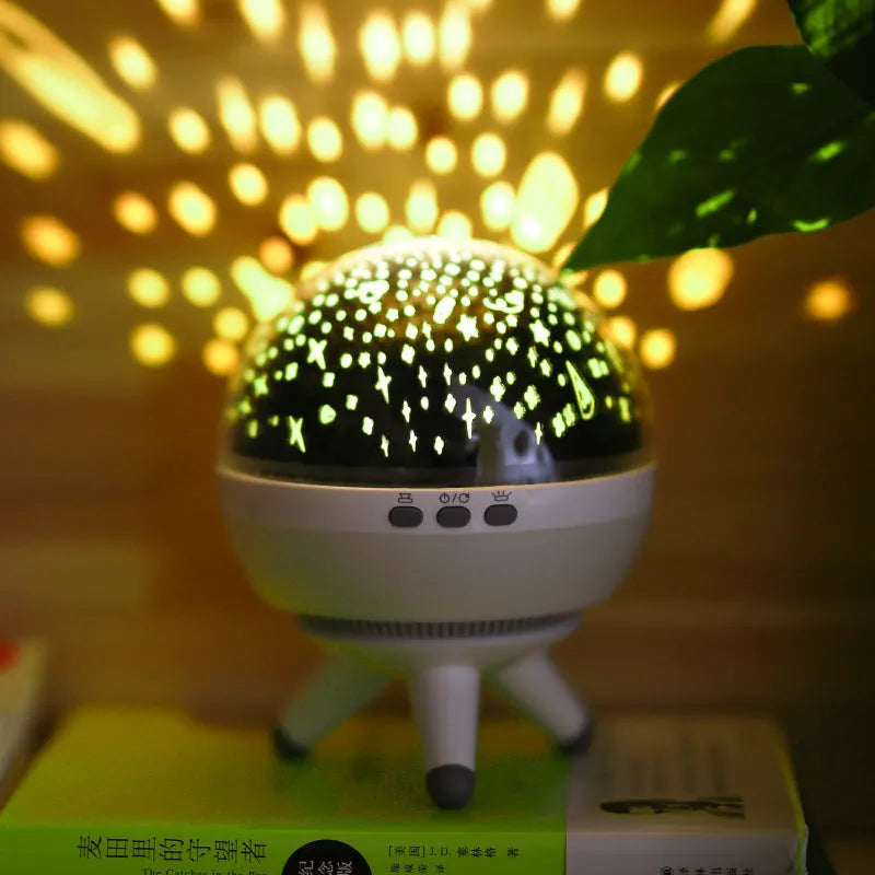 Rotating starlight projection night light with cartoon design in black or white colour options
