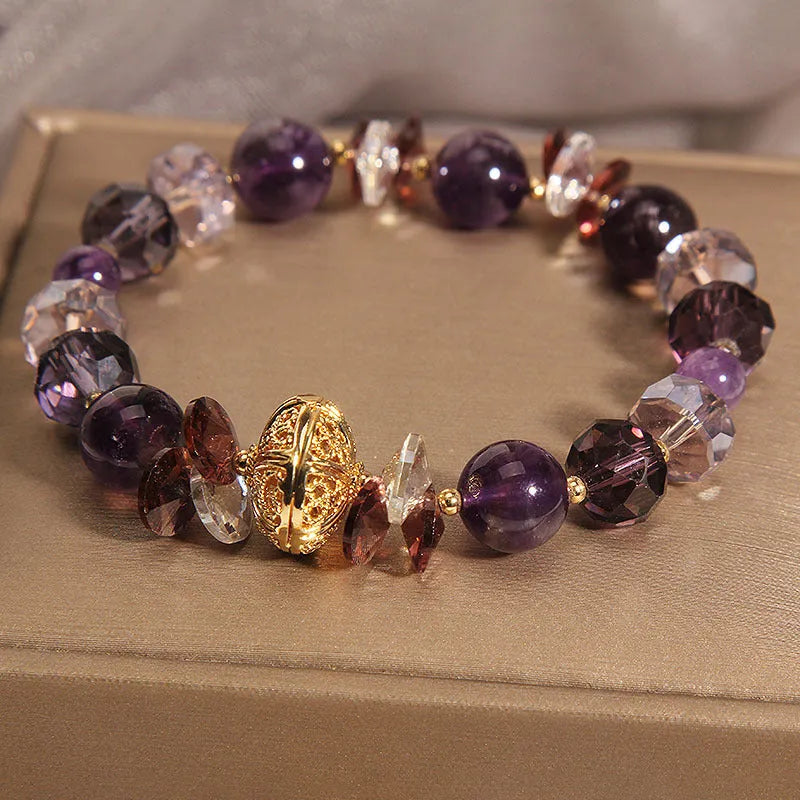 Purple crystal pumpkin beads bracelet for women with wind chime charms and rhinestone details