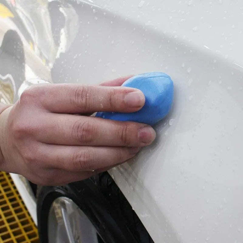 Dark blue Magic Clay car washing mud block with universal fit for paint decontamination