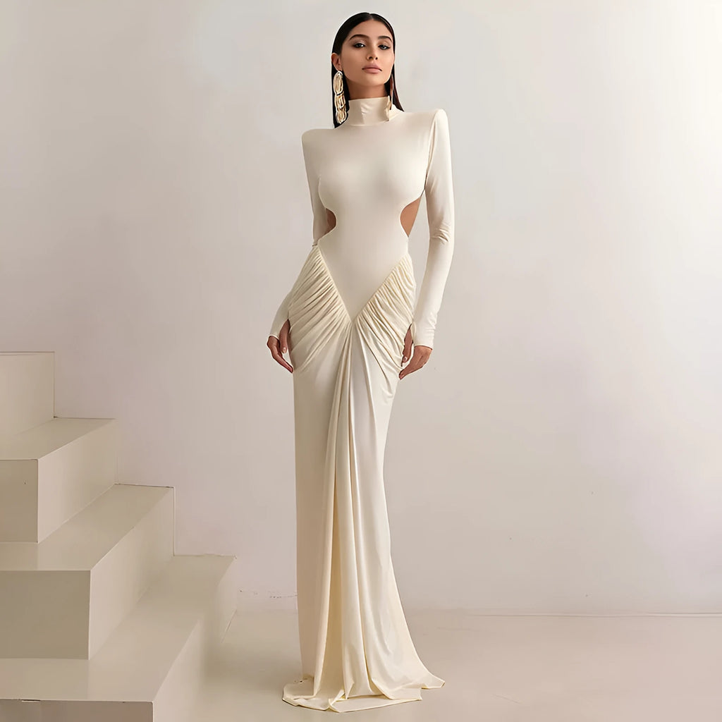 Women's slim fit long sleeve dress with high collar and pleated backless detail in apricot colour.