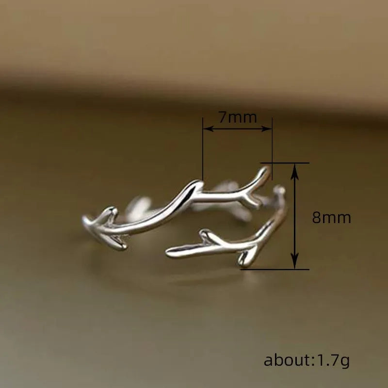 Minimalist Branches classic adjustable ring in white gold colour with leaf and geometry design on copper base