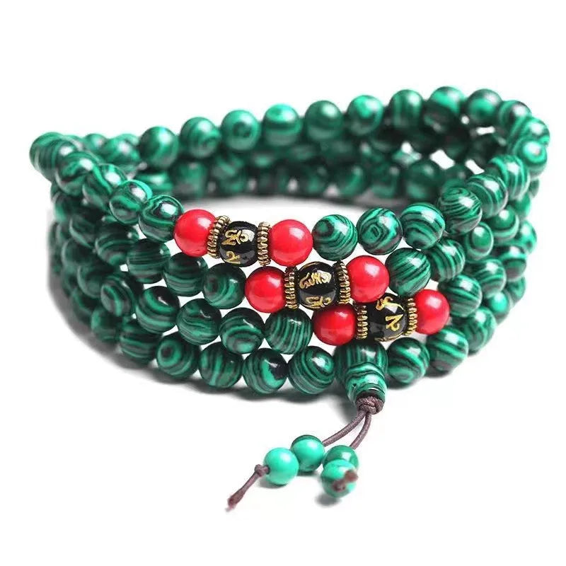 Turquoise-coloured 108 bead Buddhist Mala bracelet with round polished beads on adjustable string