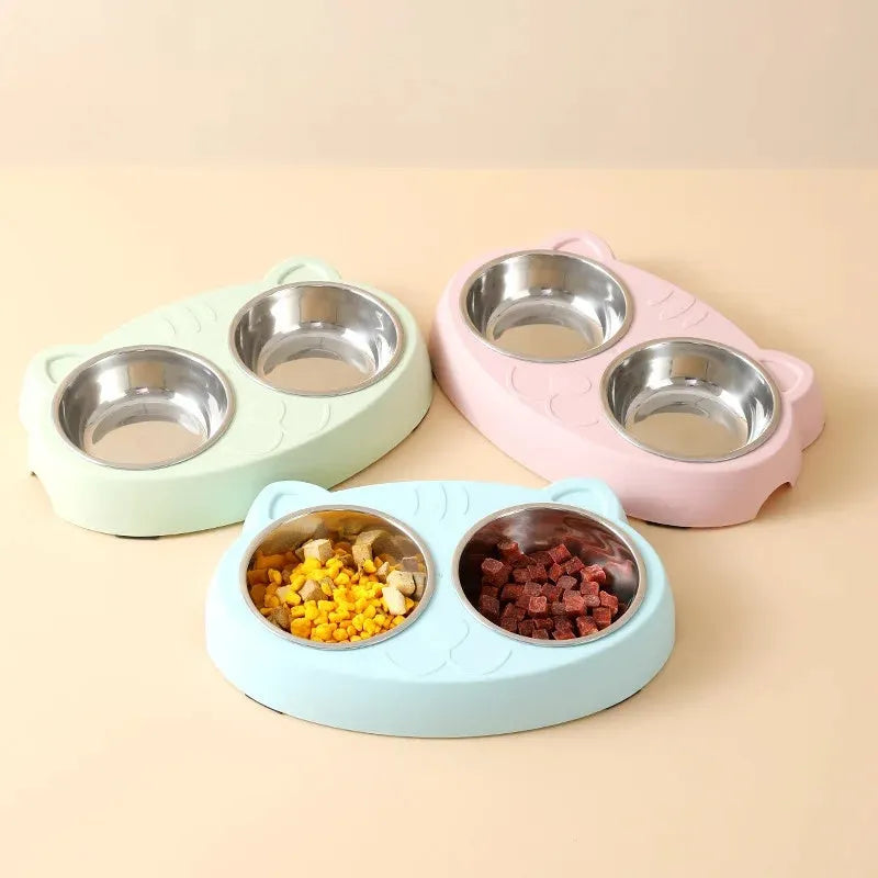 Blue plastic double-bowl pet feeder with non-slip rubber feet for cat or small dog food and water