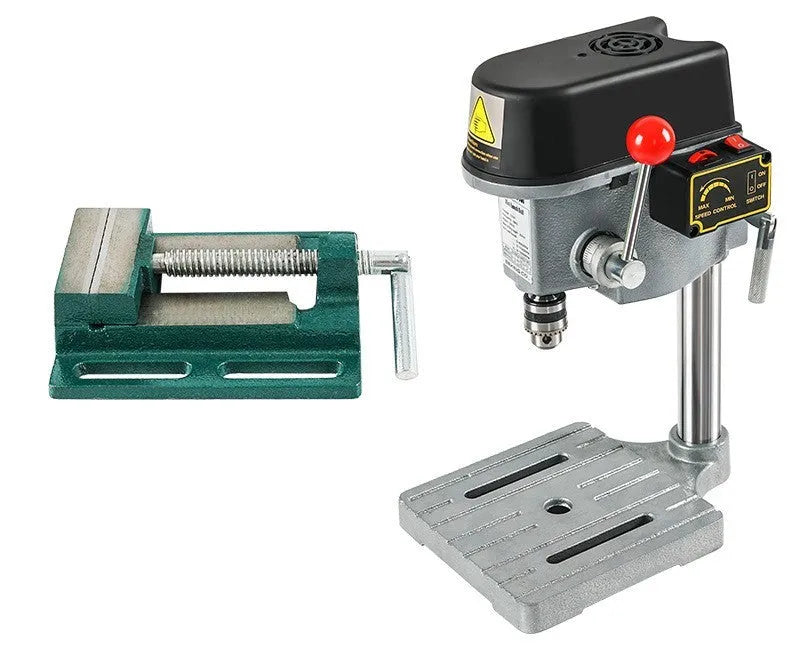 Mini bench drill and milling machine with 1050W drill and bench pliers on a workbench.