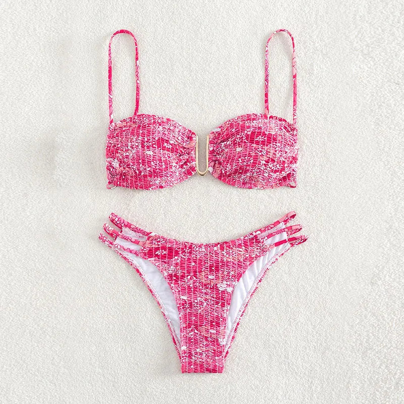 Women's floral bikini swimsuit with high-waist briefs in solid colour patterns