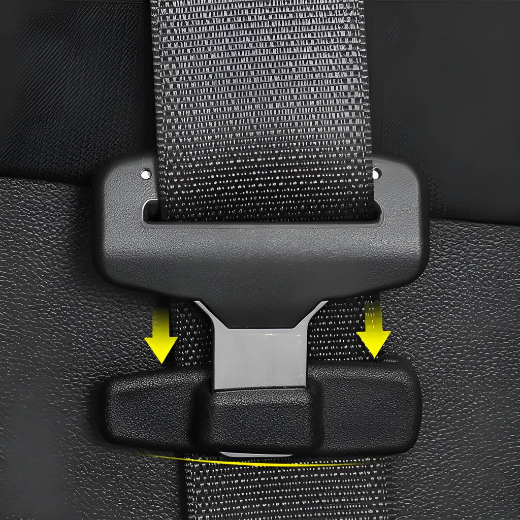 Two black ABS plastic car seatbelt stopper clips for adjusting length and preventing neck pinch.