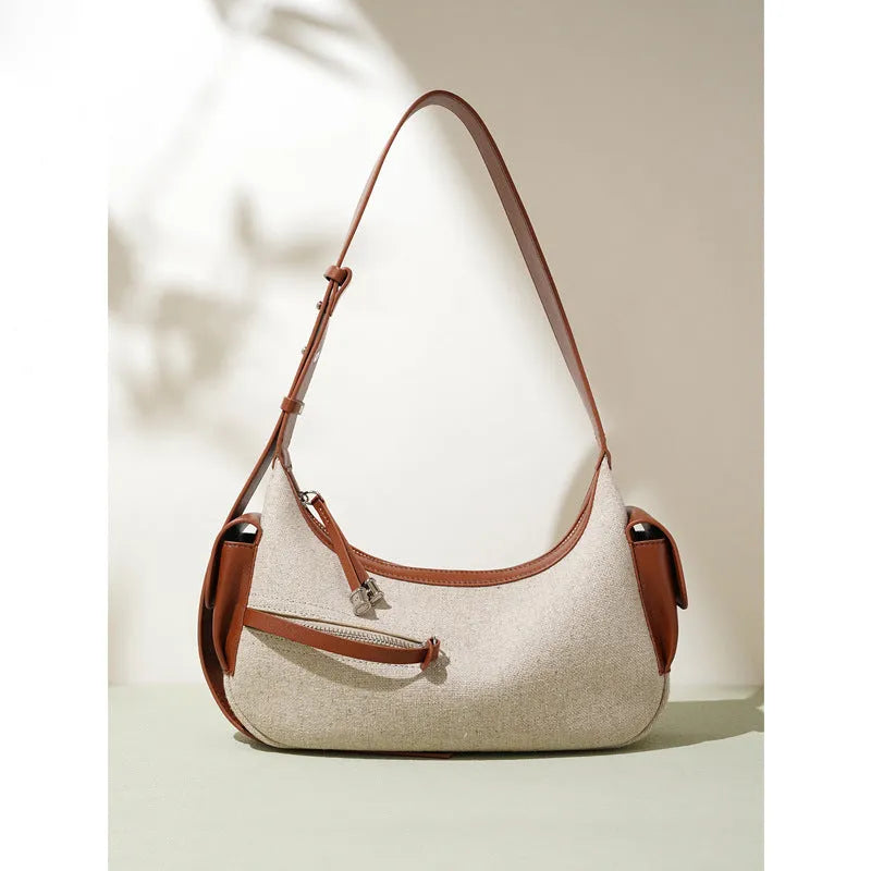 Women's genuine leather messenger bag in Linen Black with horizontal square shape and contrast stitching