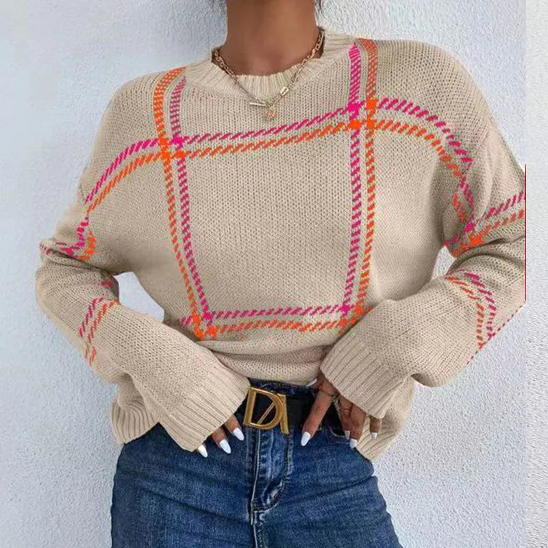 Women's loose-fit acrylic pullover sweater with a red, green, and beige plaid colour-block pattern.