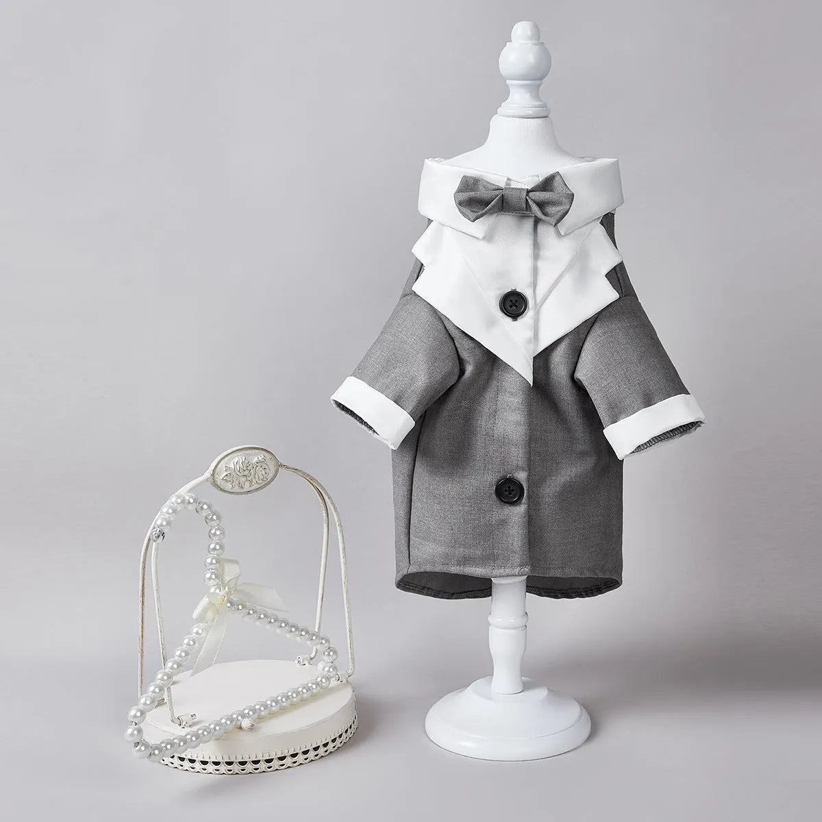 Chinese-style four-legged polyester wedding suit for a dog or cat in black.