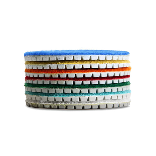 10 emery stone polishing pads in assorted grits with 80mm diameter and 10mm centre holes