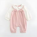 Pink baby girls embroidered jumpsuit with long sleeves and a single-breasted closure.