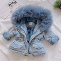 Blue girls' denim coat with a non-removable hood and fleece lining, shown on a hanger.