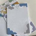 INS Wind Marshmallow Dog B5 sticky note paper pad showing colourful puppy cover designs.