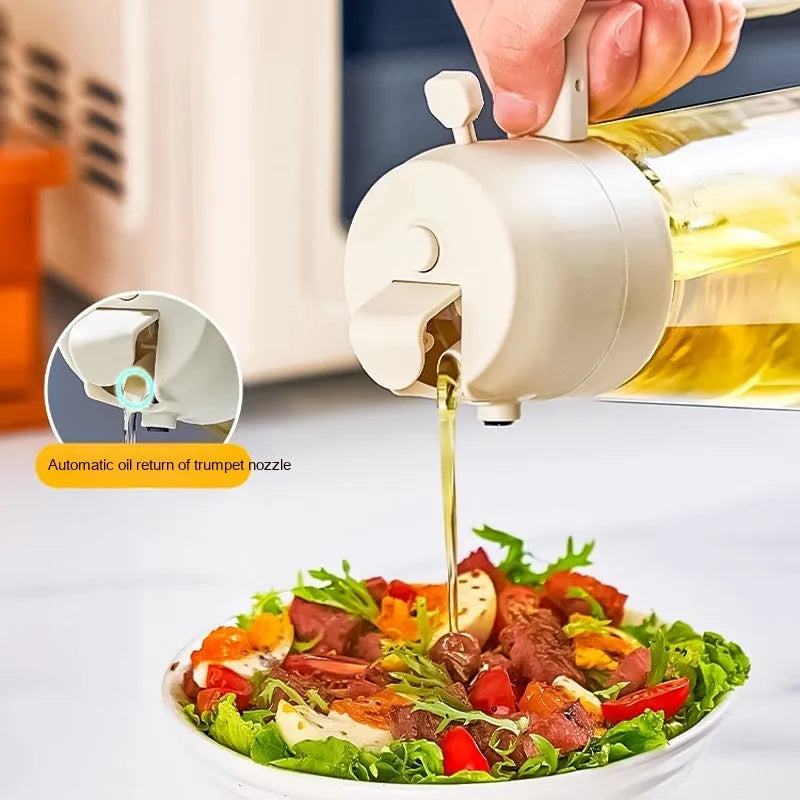 Glass olive oil sprayer bottle with ergonomic handle in beige, showing spray and pour functions.