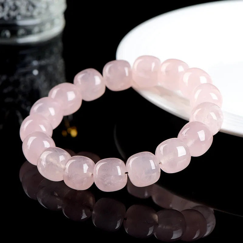Pink crystal barrel bead bracelet with natural bamboo elements, geometric 11-12mm beads