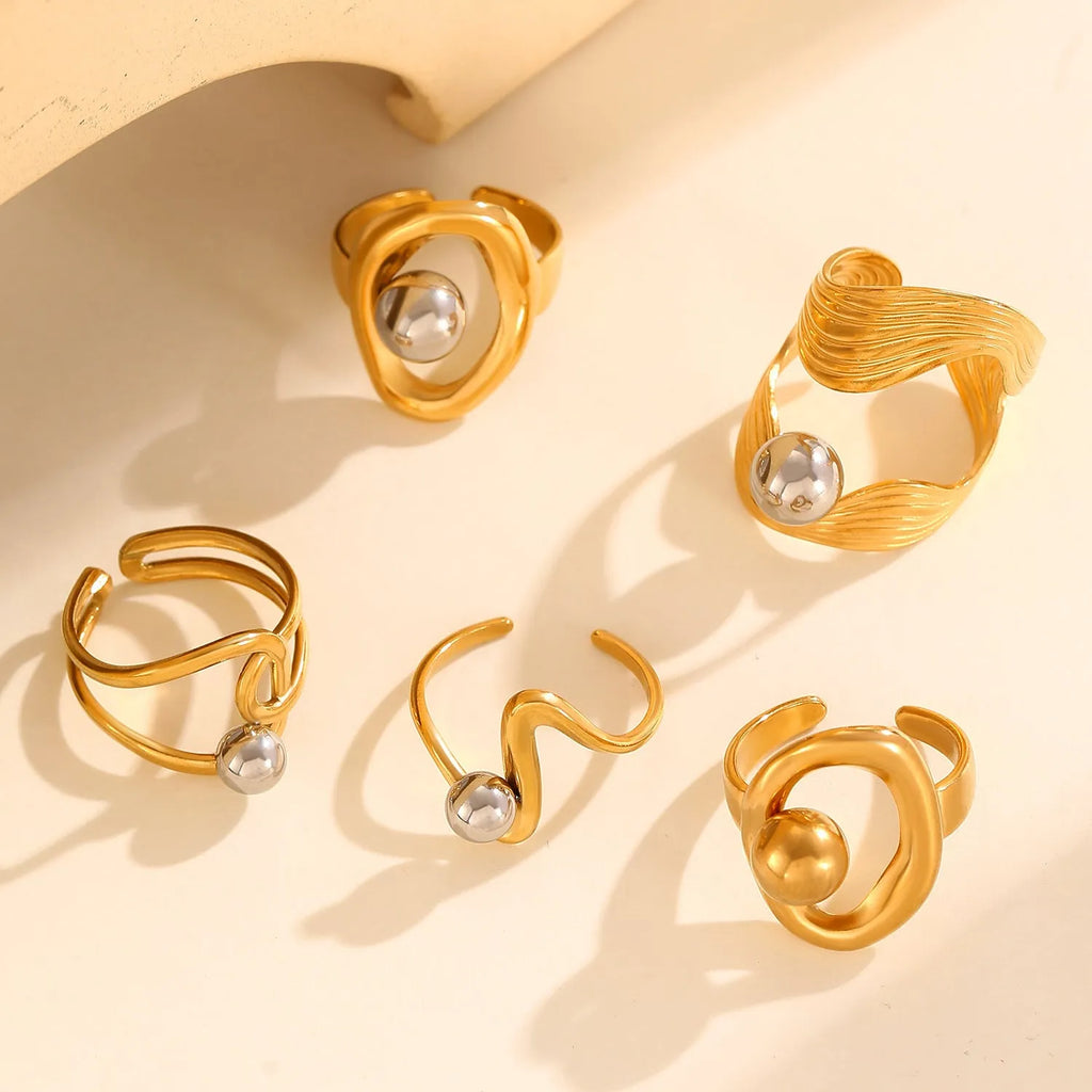 Geometric hollow line open ring in 304 stainless steel with 18K real gold finish, ellipse design