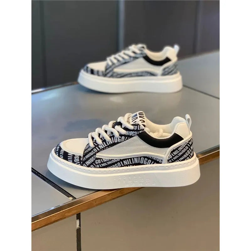 Men's white canvas board shoes with thick rubber sole and low heel, shown in white, black, grey, and green colour options.