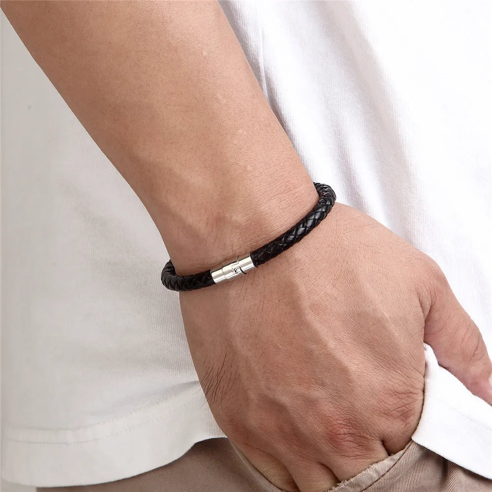 Titanium steel geometric wire bracelet with a magnet clasp shown in one of four colour options.