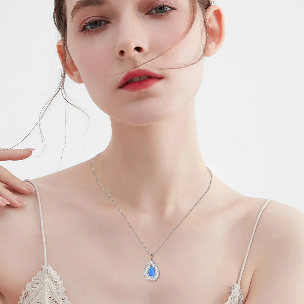 Sterling silver blue opal teardrop necklace with Austrian crystal on white gold plated chain