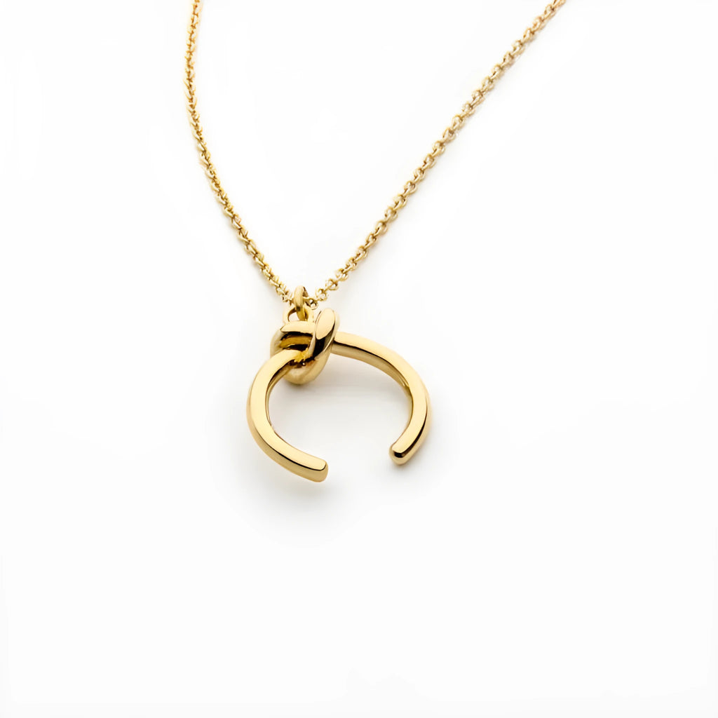 Copper geometric vintage pendant necklace with a cross chain in a gold electroplated finish.