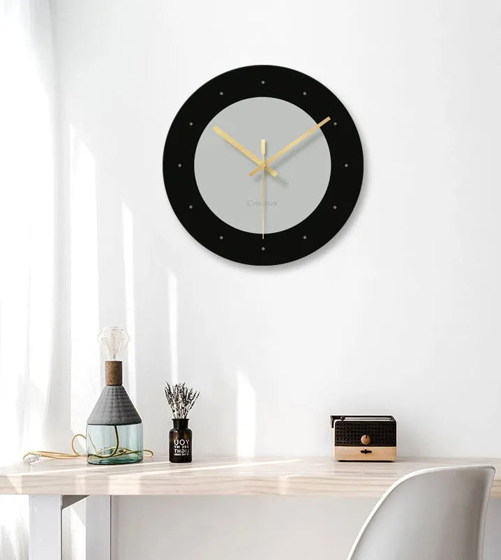 Transparent tempered glass minimalist wall clock with silent movement on a white wall.