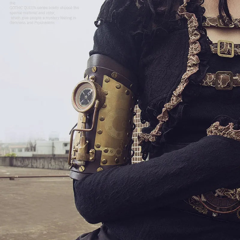 Steampunk compass bracelet with black PU leather strap and antique brass compass pendant on display